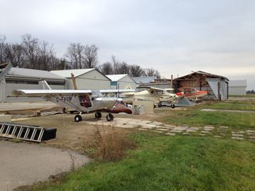 These aircraft were inside hangars that blew away.