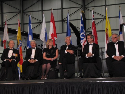 The inductees for Canada’s Aviation Hall of Fame for 2014 were presented at the WestJet hangar on May 29.  Inducted this year, from left,  were  Robert Engle,  Clive Beddoe,  Lorna deBlicquy (inducted posthumously and represented by her daughter, Elaine deBlicquy), and  Fred Moore.  They were joined on stage by 2005 inductee Colonel (Ret.) Chris Hadfield and Hall of Fame Chairman Tom Appleton