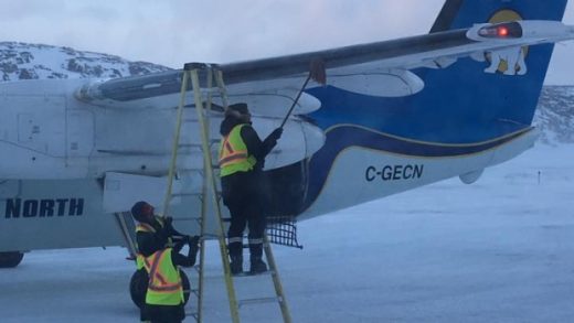 A passenger submitted this  photo of manual deicing to the CBC.