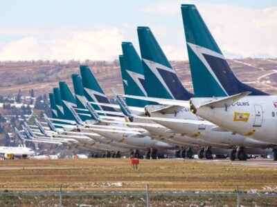 WestJet Blames COVID Policy For Cuts